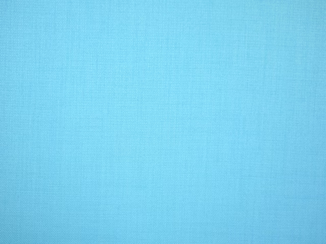 Cool aqua turquoise flat-weave fabric with subtle fine woven texture