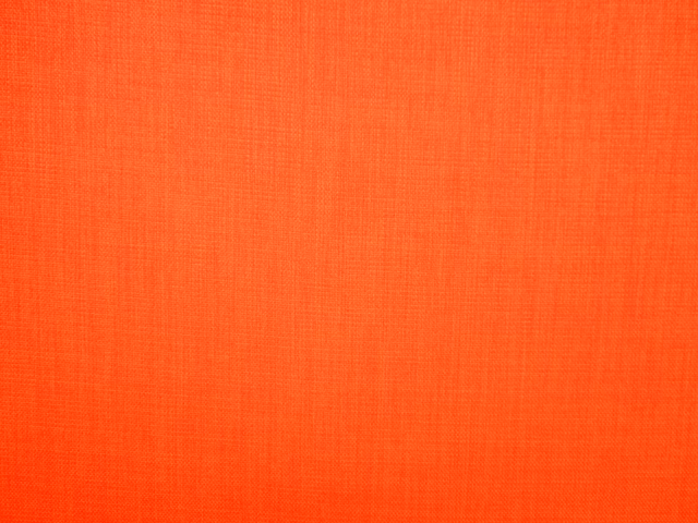 Vivid red-orange Turin flat weave with fine vertical and crosshatched texture