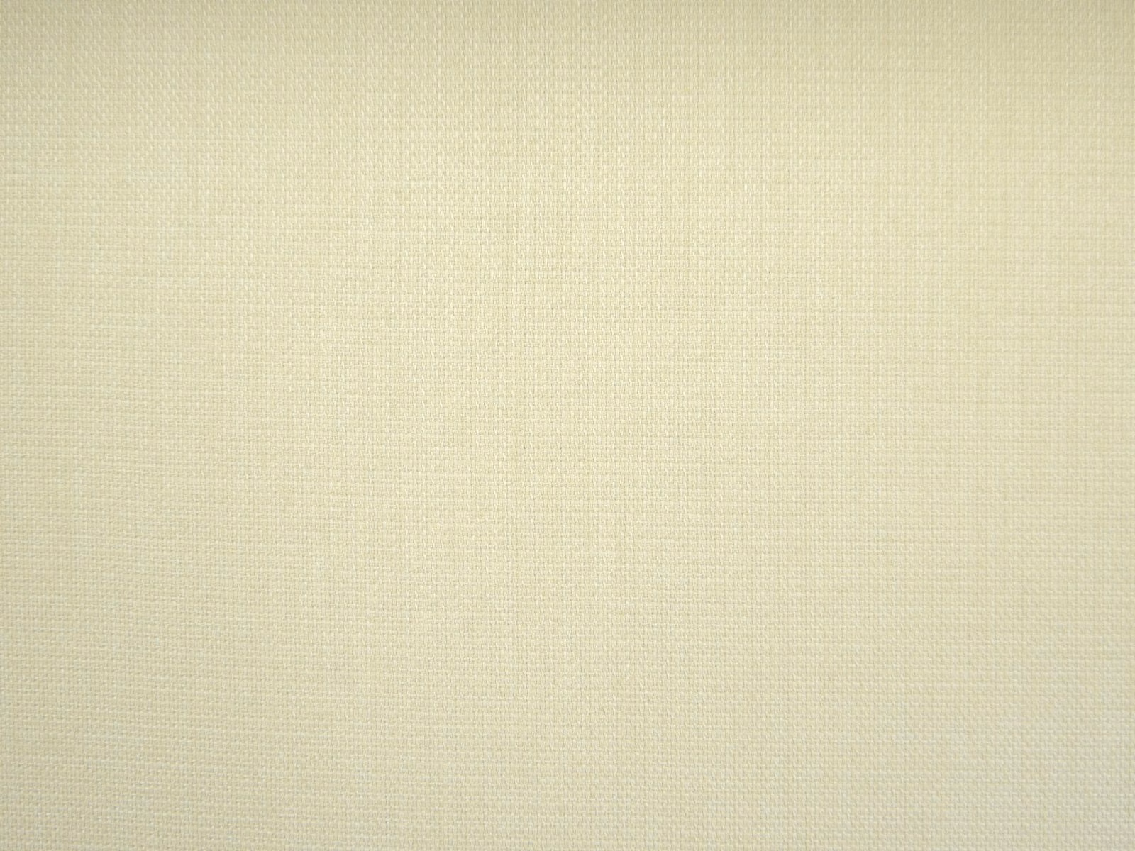 Pale sage-cream flat weave with a fine, softly textured grid