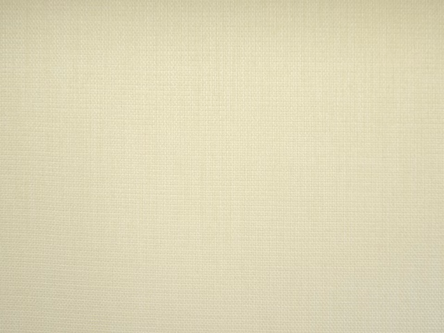 Pale sage-cream flat weave with a fine, softly textured grid