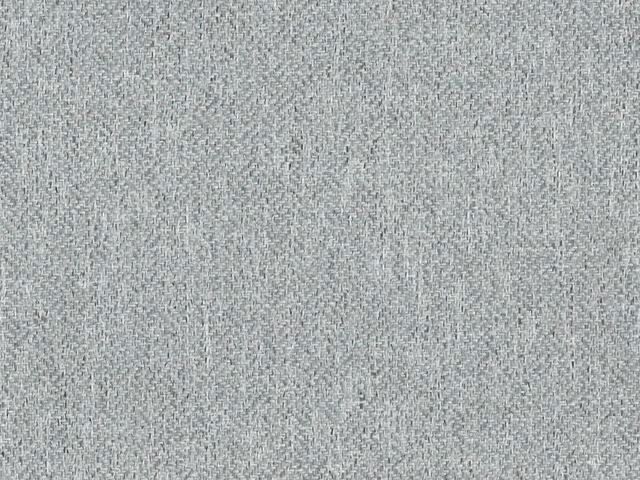 Close-up of cool mineral-grey chenille with a softly flecked woven texture