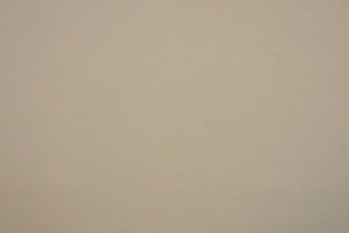 Pale warm taupe faux leather with a subtle fine-grain surface