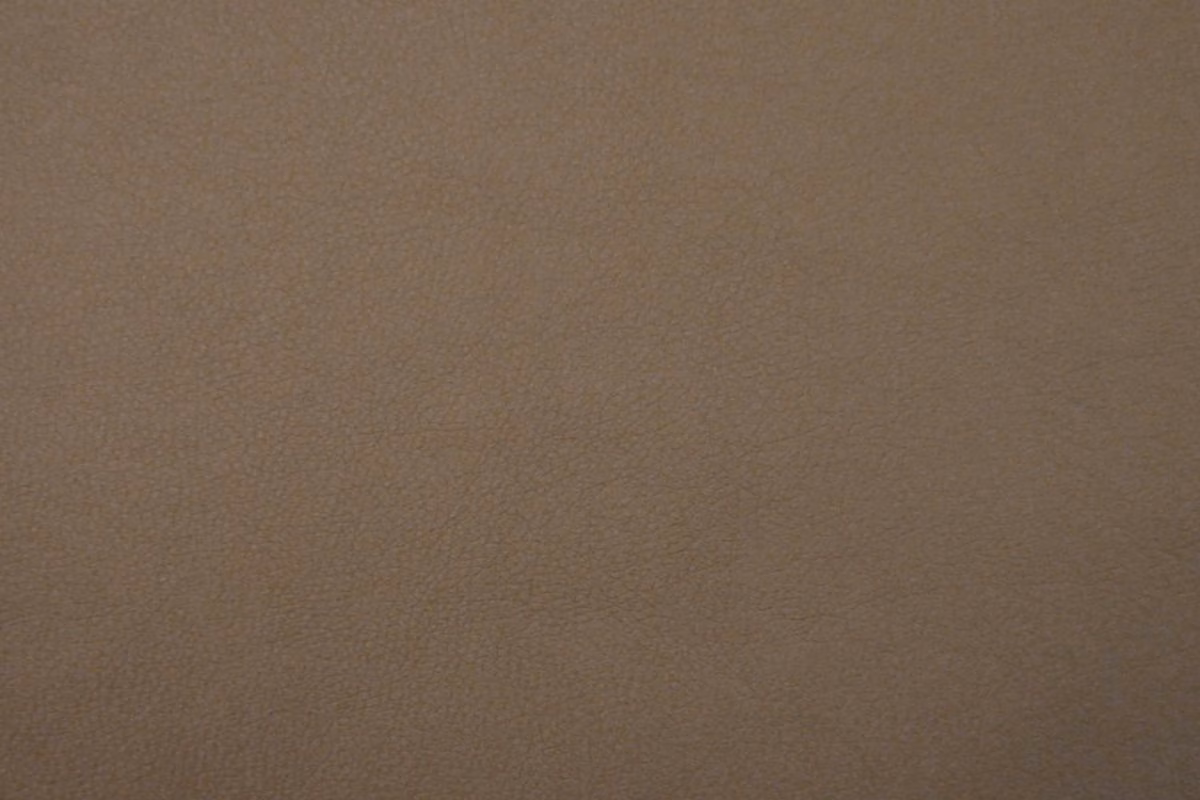 Warm mushroom taupe faux leather with a subtle fine-grain mottled surface