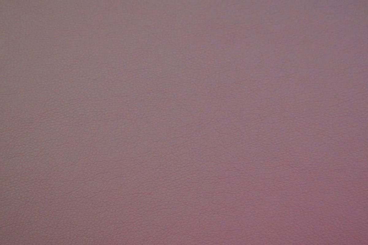 Muted mauve-taupe faux leather with a subtle, even pebbled grain