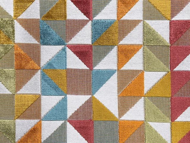 Geometric velvet with ochre, teal, burgundy, sage and cream triangular blocks