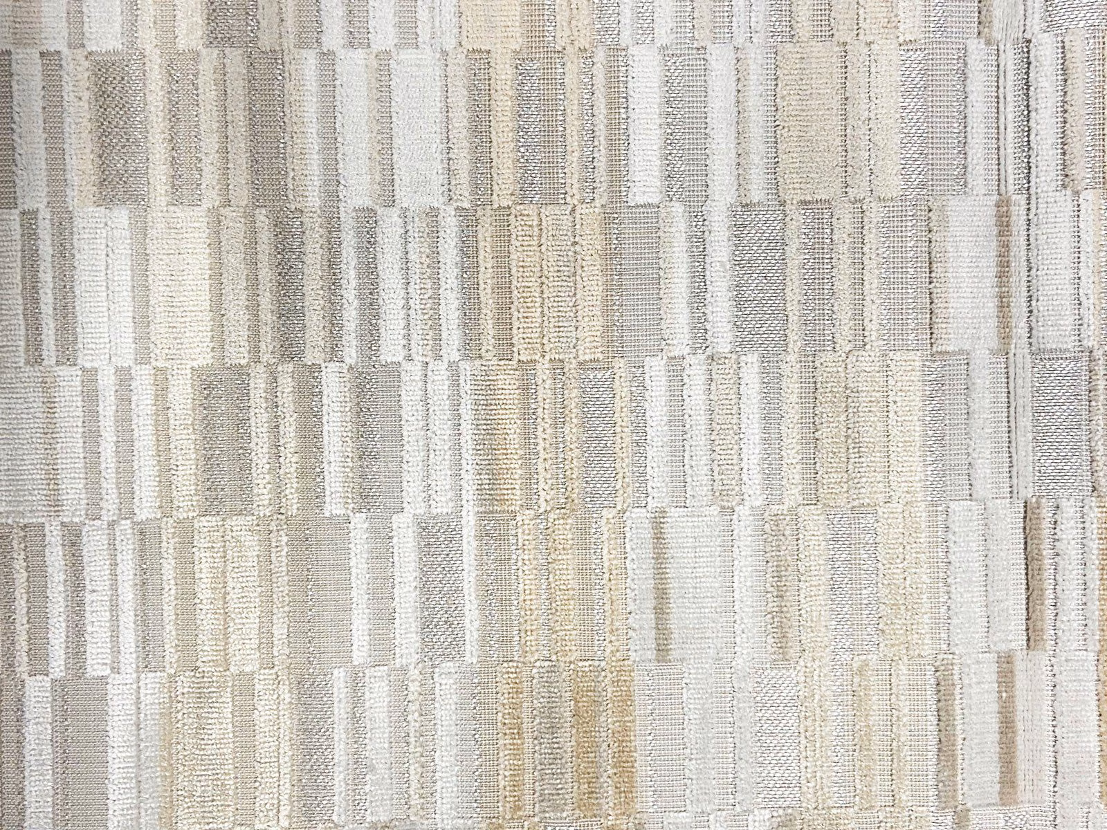 Pale ivory-grey velvet with vertical woven blocks and subtle taupe flecks
