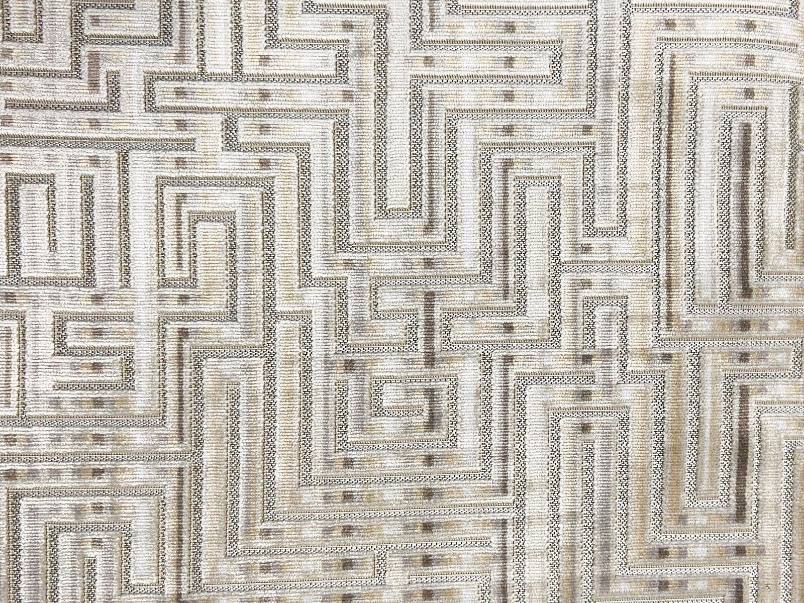 Ivory velvet with taupe-grey labyrinth lines and a softly ribbed sheen