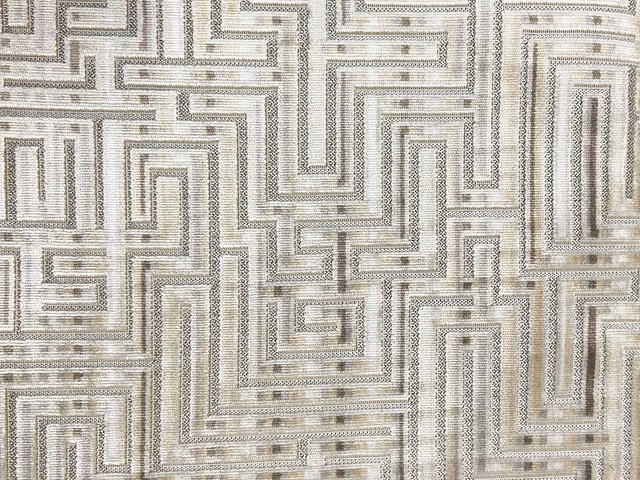 Ivory velvet with taupe-grey labyrinth lines and a softly ribbed sheen