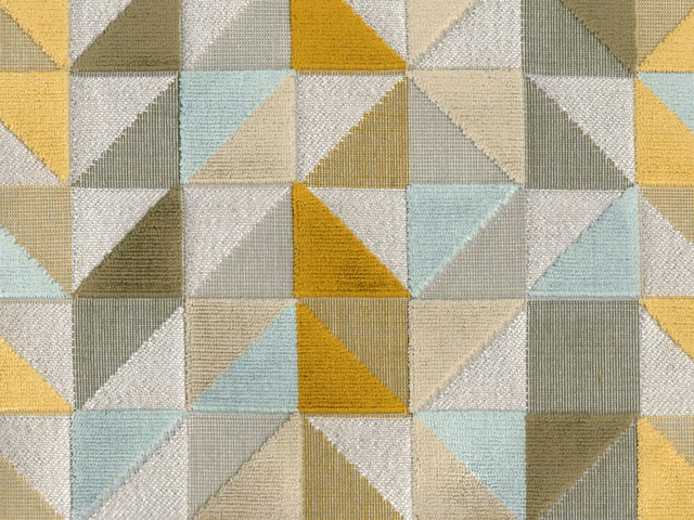 Muted mustard, sage, pale blue and cream triangular geometric velvet texture