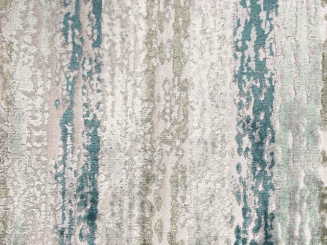 Pale mineral velvet with distressed vertical bands in teal, sage and soft blush