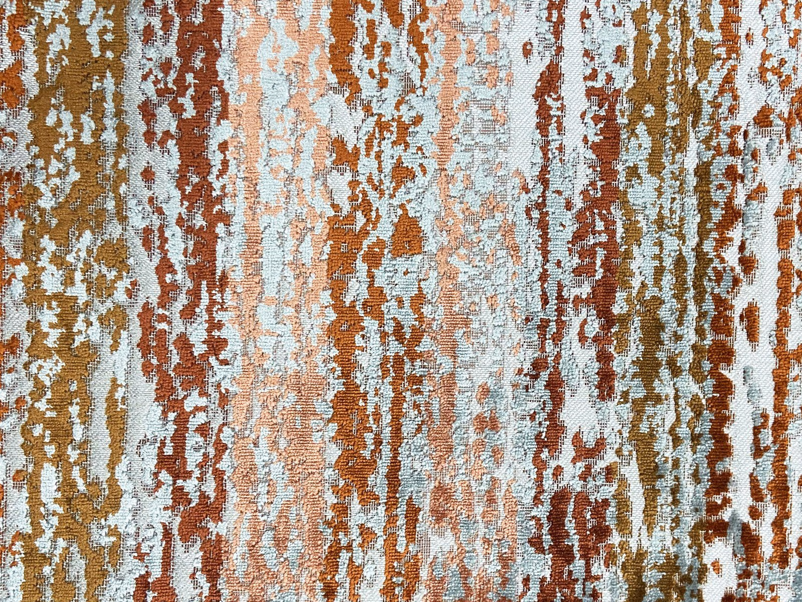 Icy blue velvet with rust, ochre and cream distressed vertical striations