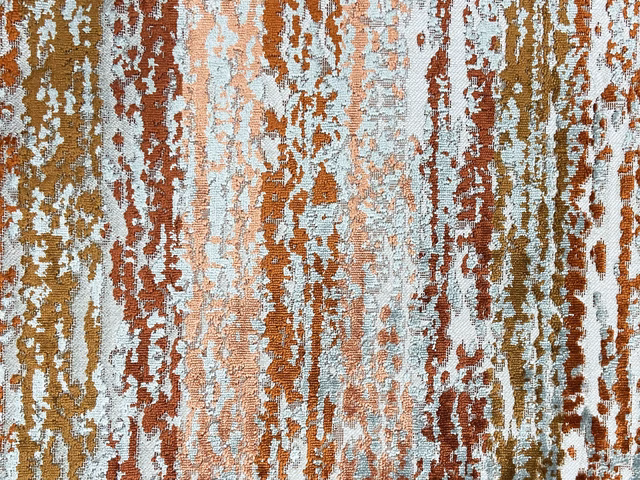 Icy blue velvet with rust, ochre and cream distressed vertical striations