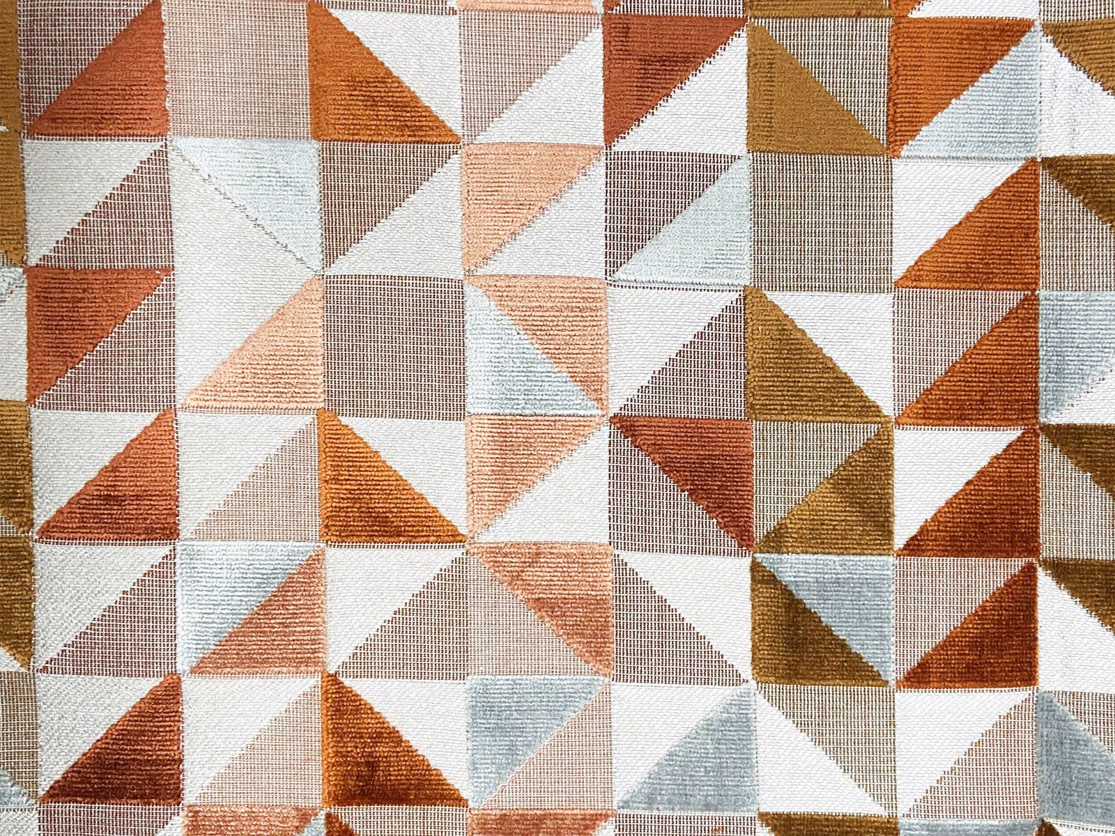 Rust, ochre and blue-grey geometric velvet with triangular patchwork blocks