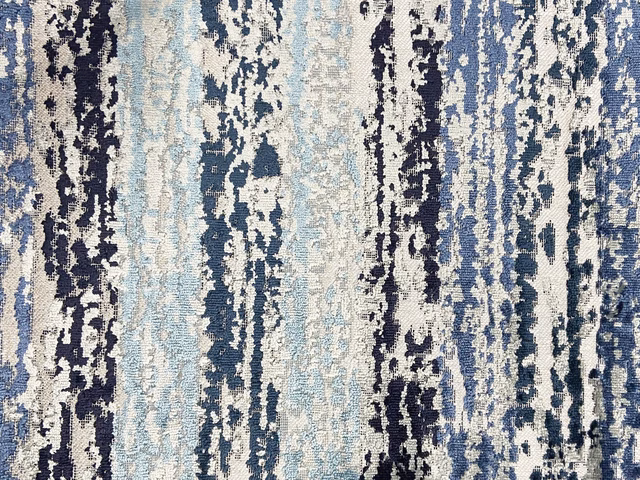 Icy blue velvet with navy and cream distressed vertical striations and plush texture