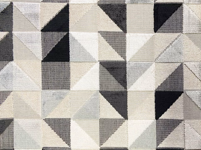 Charcoal, grey, cream and white geometric velvet with triangular woven blocks