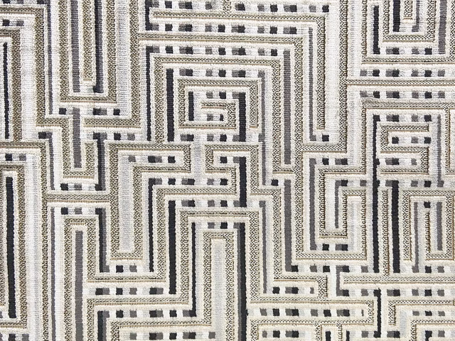 Cream velvet with charcoal maze lines and taupe dotted geometric accents