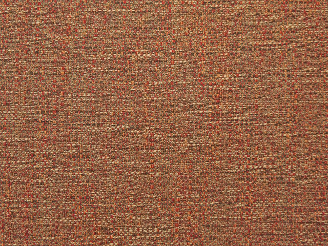 Close-up of mottled rust, red and beige chenille with a fine crossweave