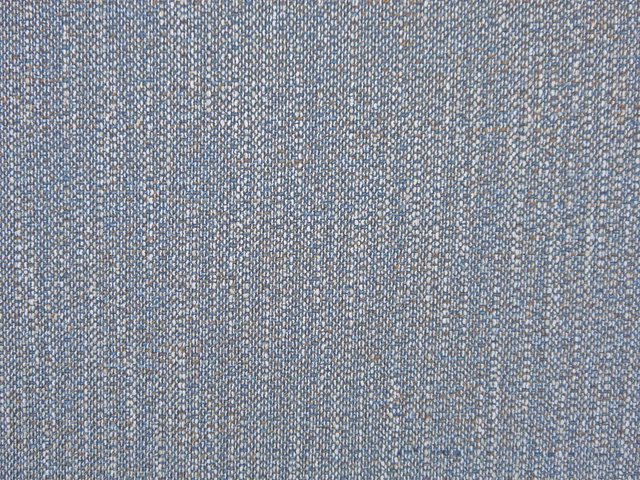 Mottled cool blue-grey chenille with pale flecks and a fine woven texture