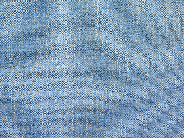 Mottled denim-blue chenille with pale blue, white and grey flecks in a close weave