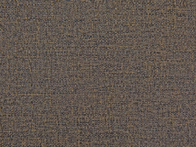 Close-up of charcoal taupe chenille with mottled brown-grey woven texture