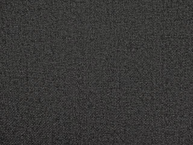Deep charcoal-grey chenille with a fine mottled woven texture and subtle graphite variation