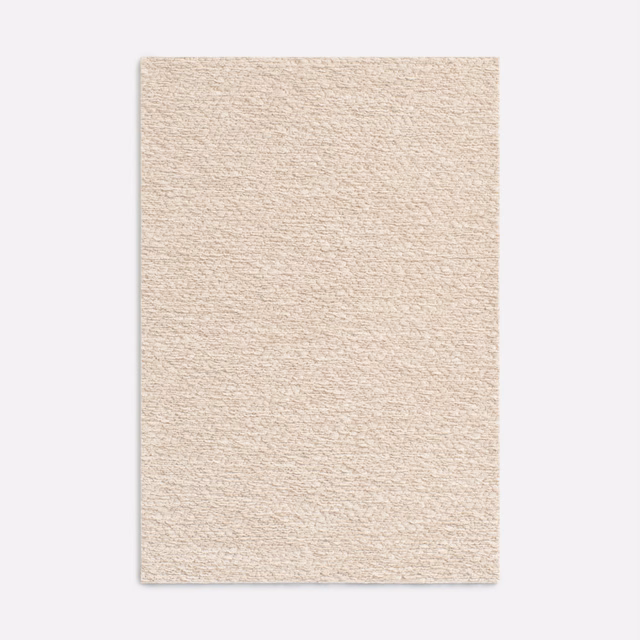Warm ivory-beige chenille with a softly nubby, subtly tonal woven surface