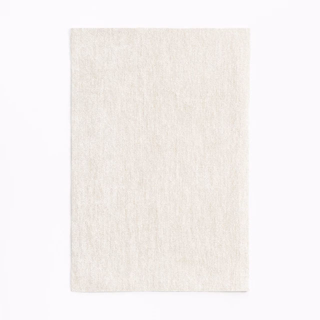 Pale ivory chenille swatch with subtle vertical slub texture and warm tonal variation