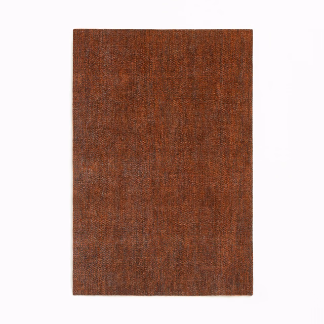 Rusty terracotta chenille swatch with fine vertical texture and softly mottled depth