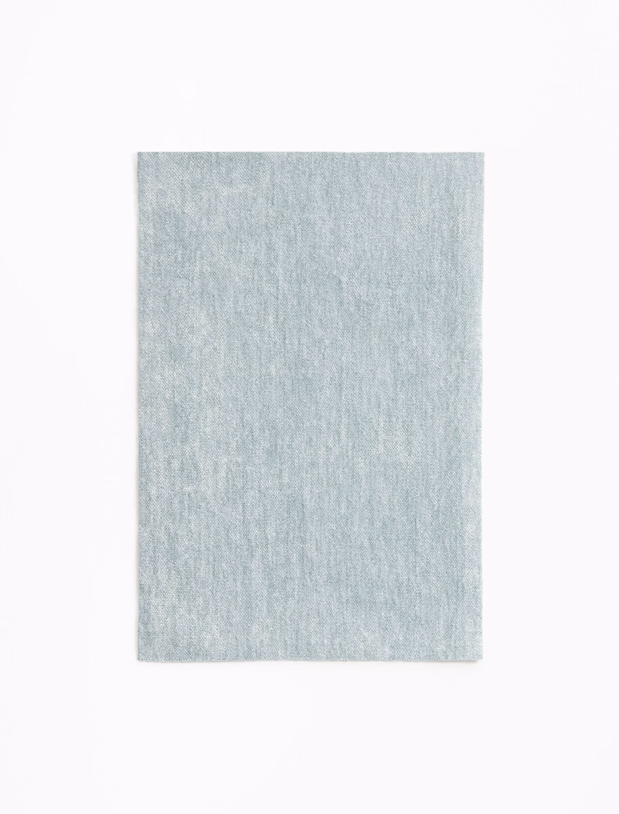 Pale glacier-blue chenille with a softly mottled, vertical textured surface