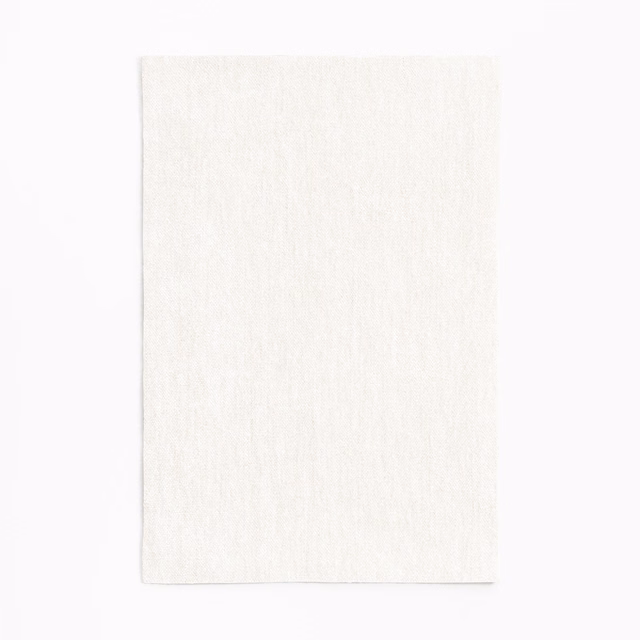Pale ivory chenille swatch with fine brushed vertical texture