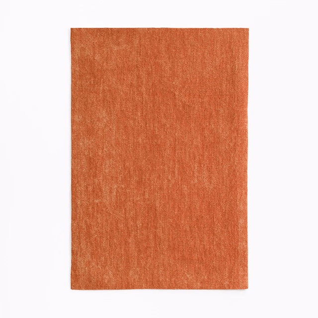 Warm potimarron chenille swatch with fine vertical texture and varied terracotta shading
