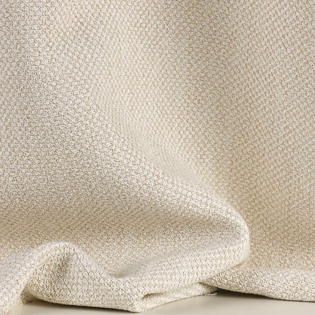 Warm ivory chenille with a dense pebbled weave in soft folds