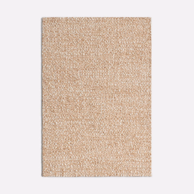 Pale oatmeal-beige chenille swatch showing a close, softly nubby woven texture