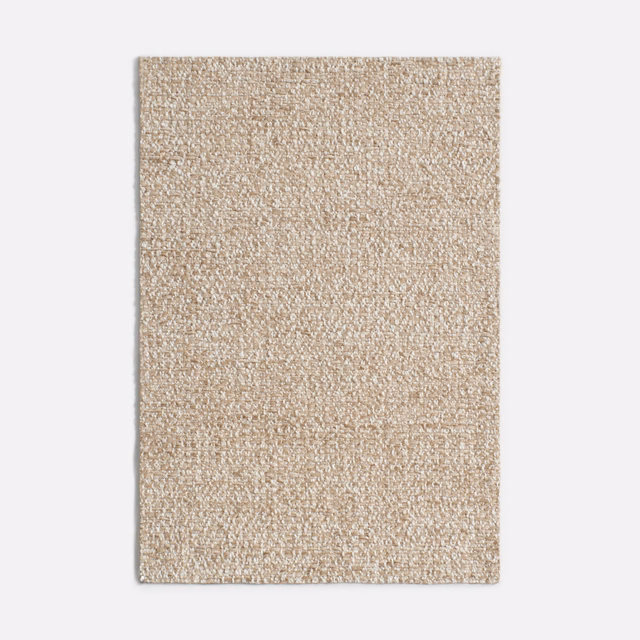 Warm sandy beige chenille swatch with a fine nubby weave and ivory flecks