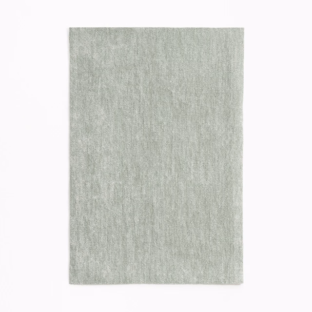 Pale sage-green chenille with softly flecked, vertical surface texture