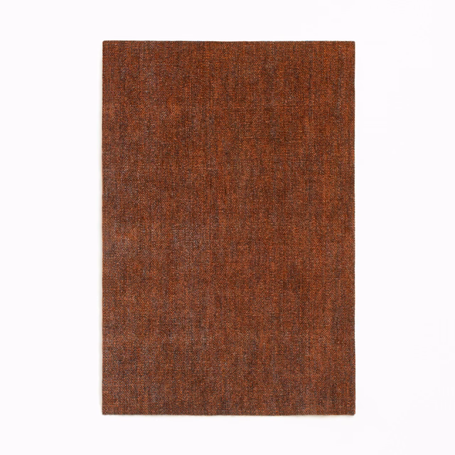 Burnt rust-brown chenille swatch with subtle vertical striations and mottled texture