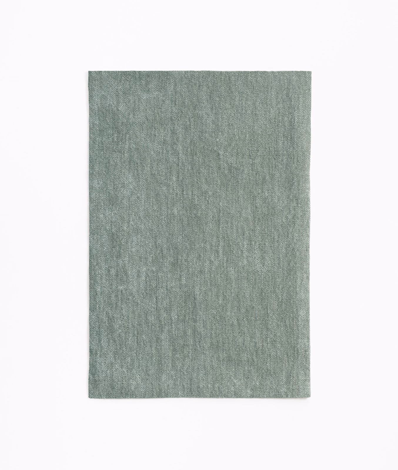Muted celadon chenille swatch with fine vertical nap and softly mottled surface