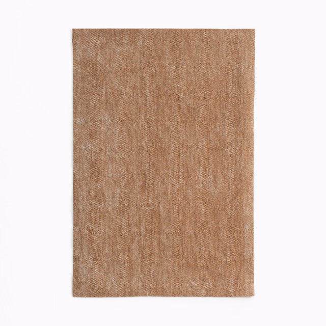 Warm camel-brown chenille swatch with subtle vertical striated texture