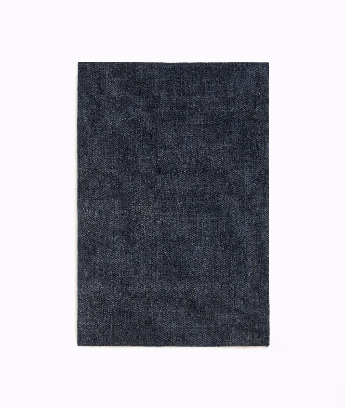 Deep blue-charcoal chenille swatch with subtle vertical tonal flecks and a softly textured weave