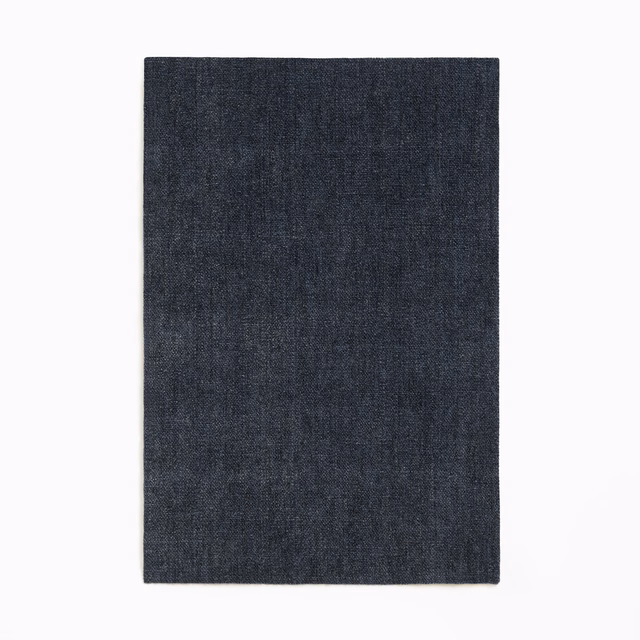 Deep blue-charcoal chenille swatch with subtle vertical tonal flecks and a softly textured weave