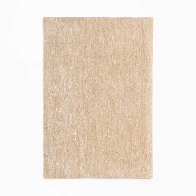 Pale nude-beige chenille swatch with subtle uneven vertical surface texture