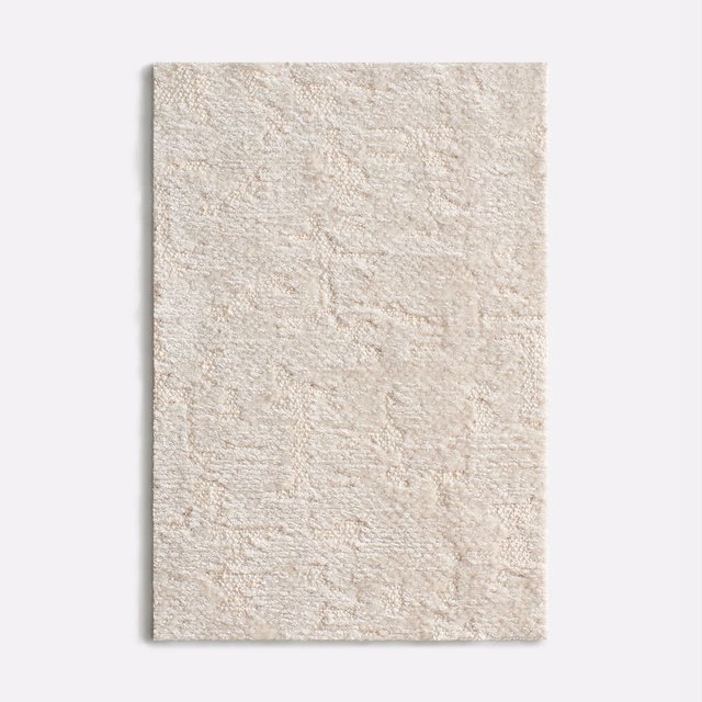 Warm ivory chenille swatch with nubby texture and subtle irregular woven lines