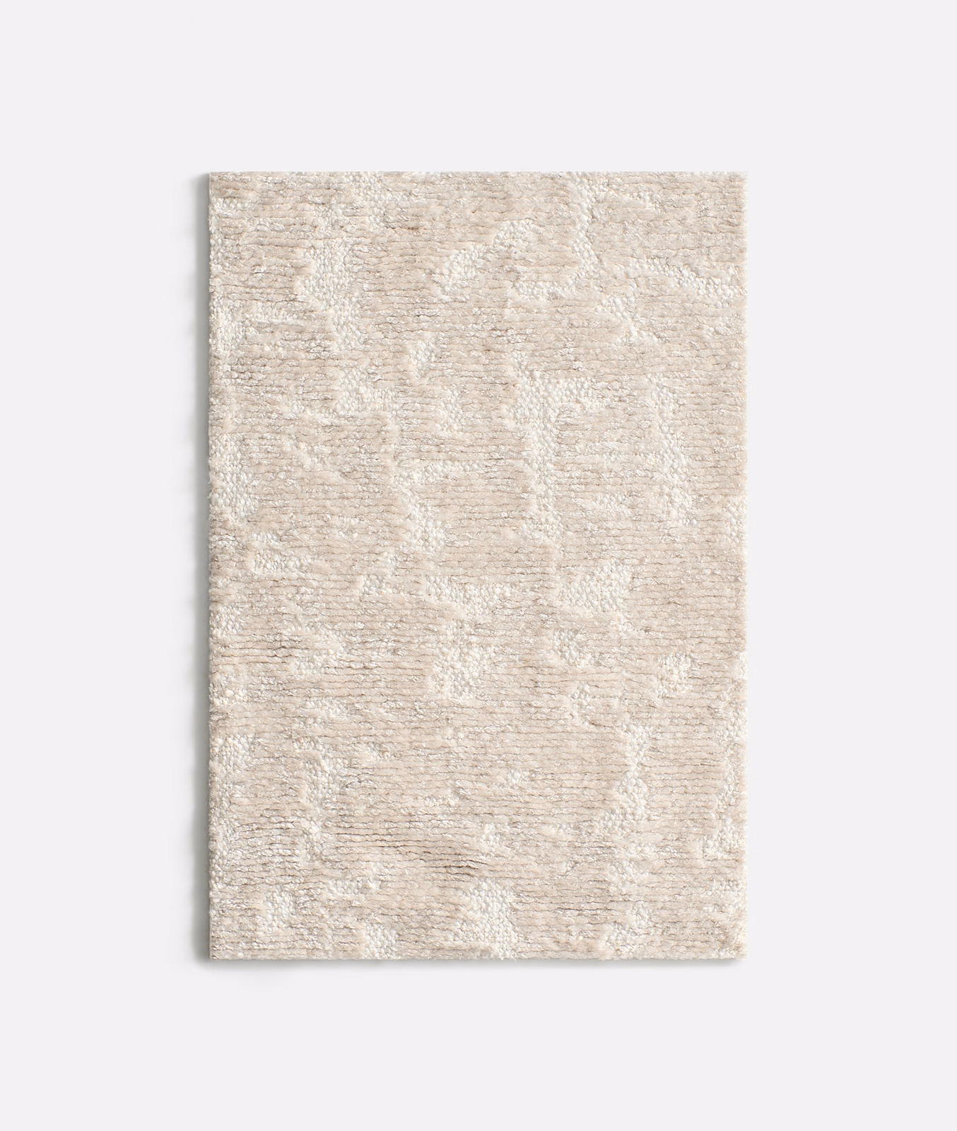 Pale blush chenille with mottled ivory-beige texture and softly rippled tonal pattern