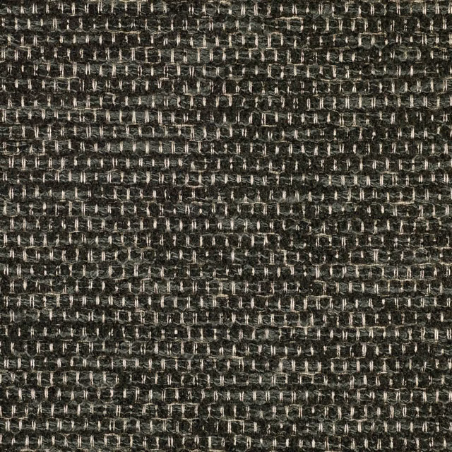 Close-up of charcoal chenille with irregular ivory flecks and compact looped texture
