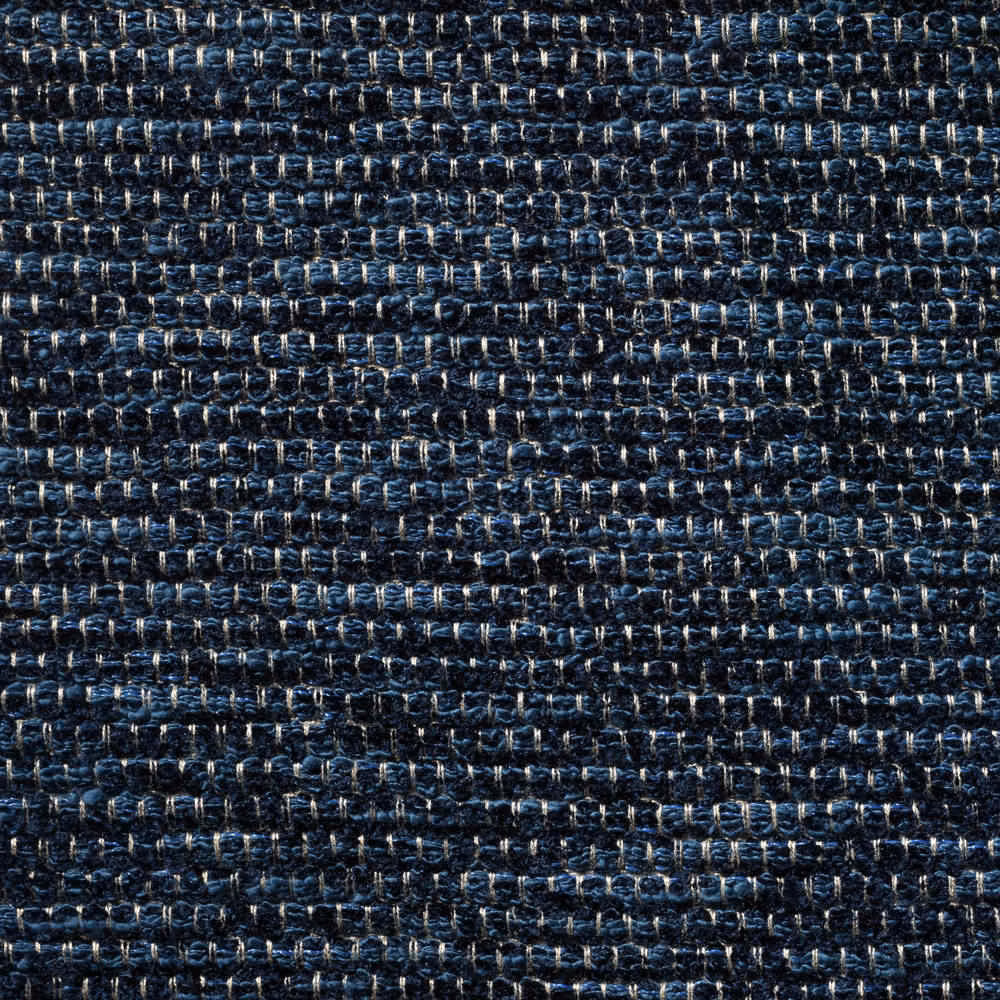 Dark indigo chenille weave with pale blue and ivory flecks in close-up