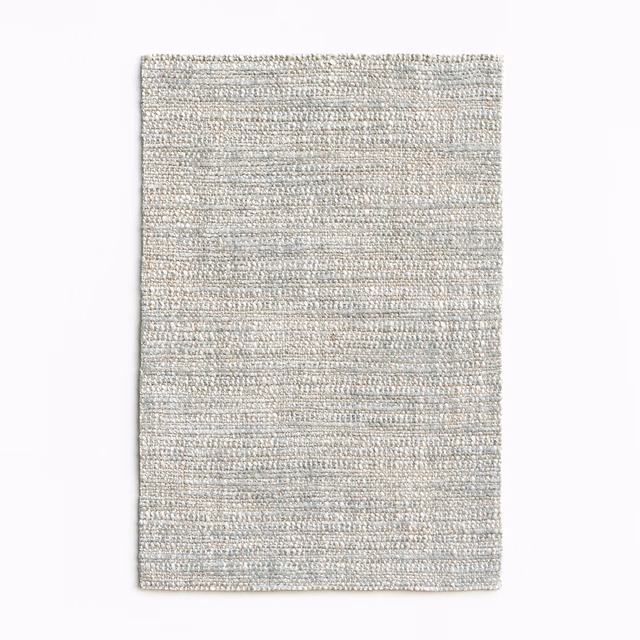 Pale glacier blue-grey chenille swatch with fine horizontal flecks and a compact weave