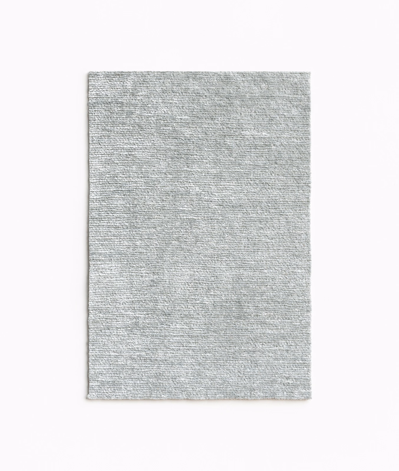 Pale glacier-grey chenille swatch with fine horizontal striations and soft tonal variation