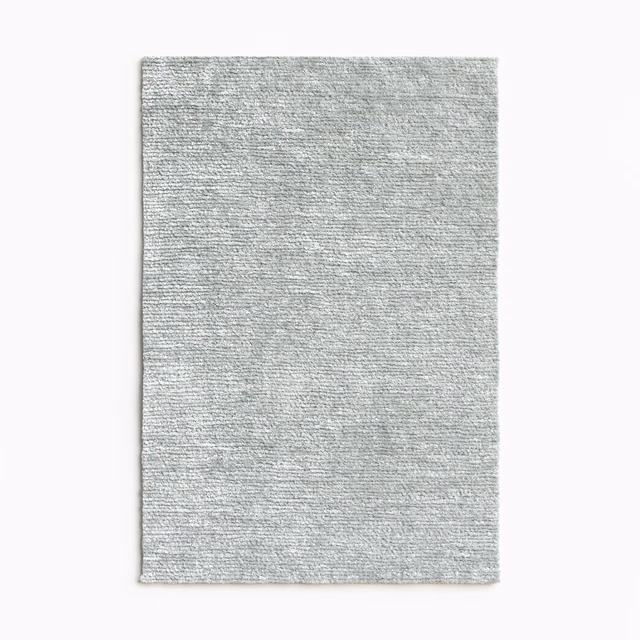 Pale glacier-grey chenille swatch with fine horizontal striations and soft tonal variation