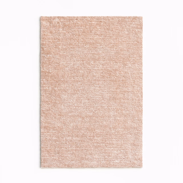Warm blush-nude chenille swatch with fine horizontal texture and softly flecked surface