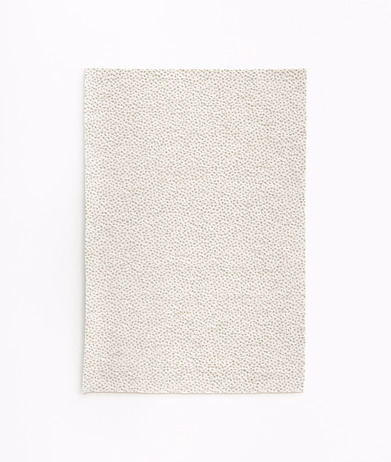 Warm ivory chenille swatch with fine sand-coloured pebbled texture